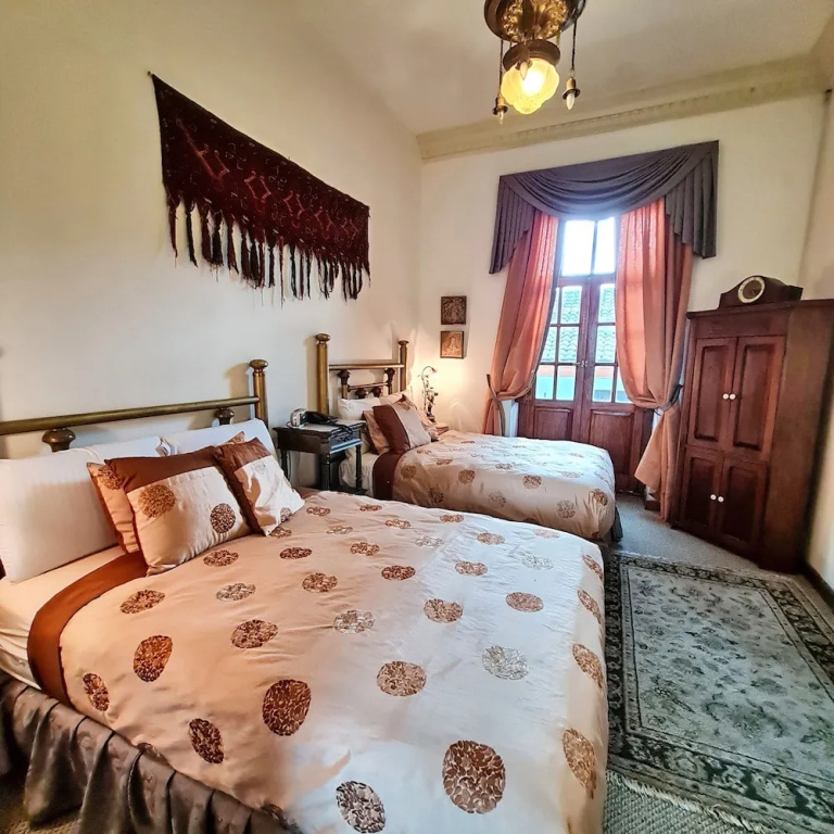 Deluxe Quadruple room with city view