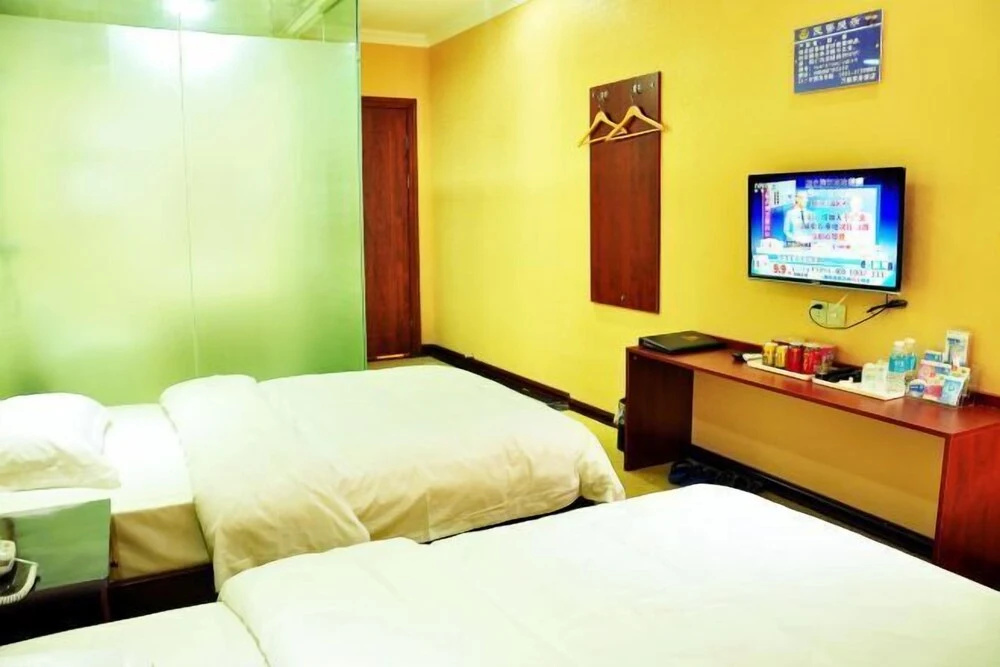 Oyo Xingyi Wanshun Business Hotel