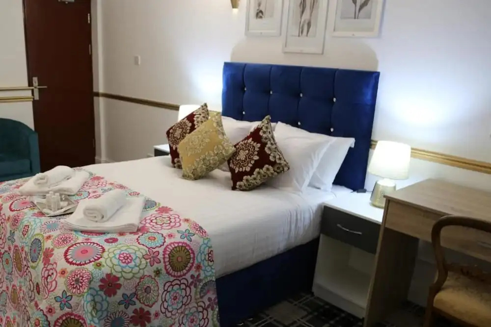 OYO 4 Sisters Inn - Chambres