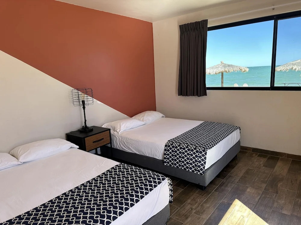 Standard Quadruple room beachfront
