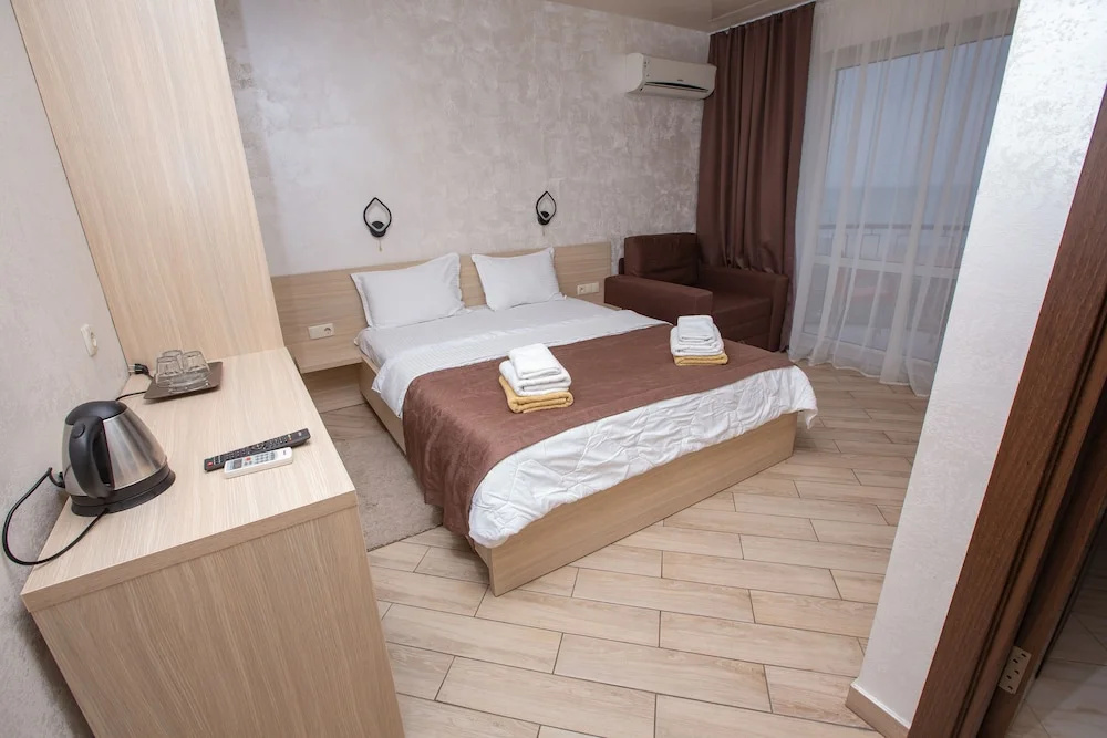 Hotel Grand More - Chambres