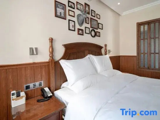 Двухместный номер Standard двуспальная кровать в Yake Town Holiday Hotel (Dehui Branch)