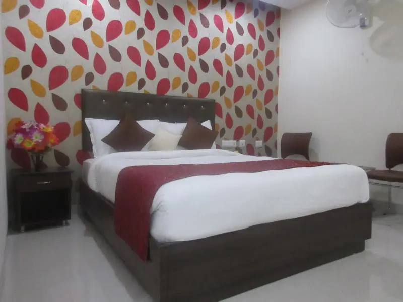 Collection O 3169 Hotel Lotus Grand - Chambres