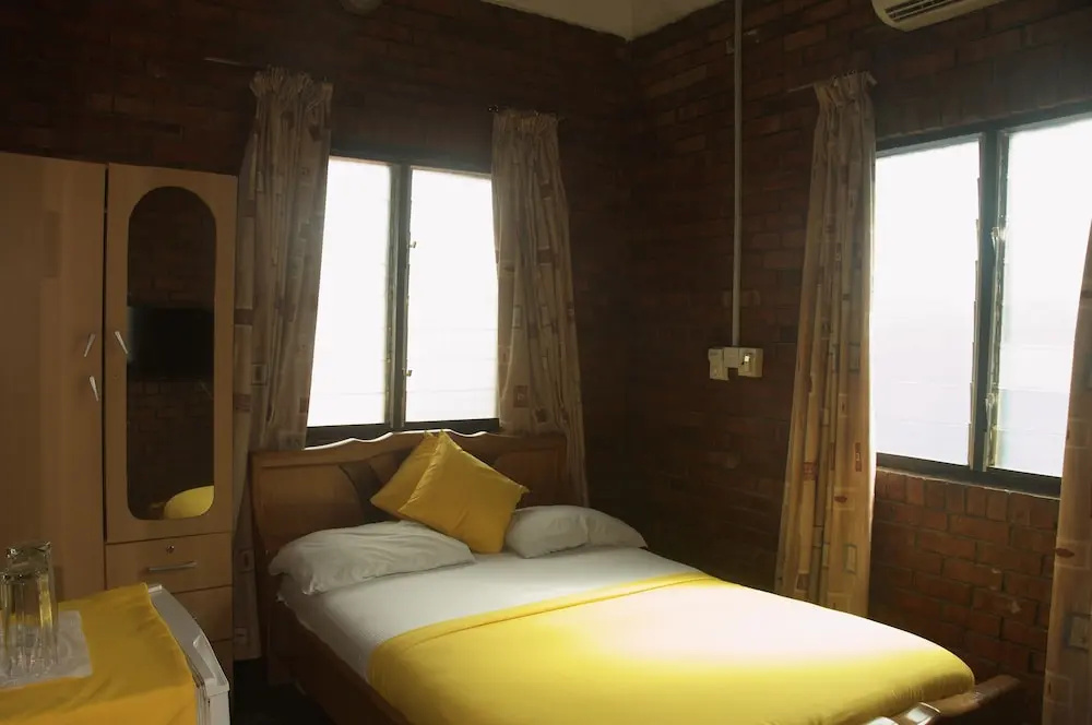 Joy Family Lodge - Chambres