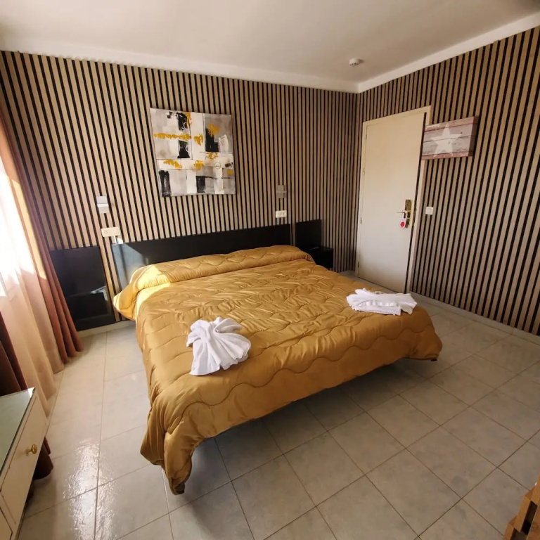 Hotel Ampuria Inn - Chambres