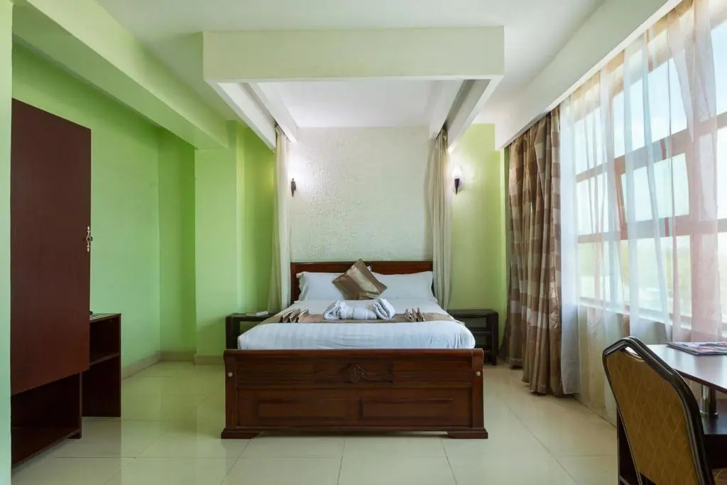 The Legacy Hotel & Suites - Chambres