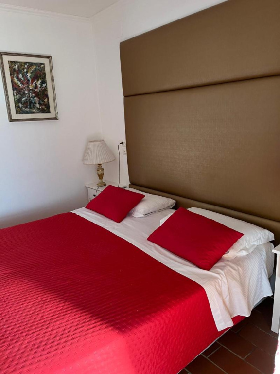 Standard Triple room with garden view