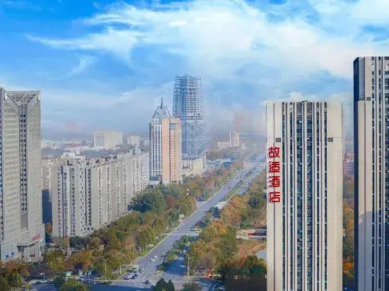 Gushi Hotel (Baolong Building 3)