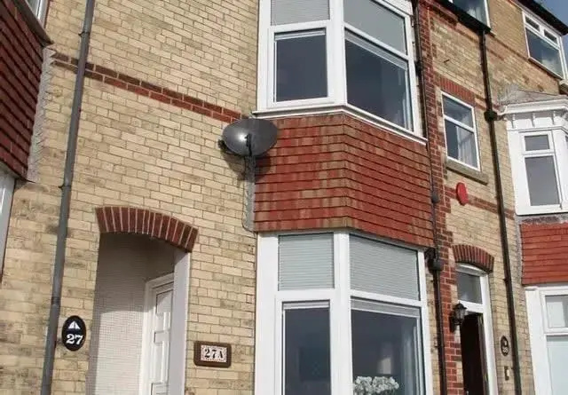 Seafront house with garden seating and stunning sea views!