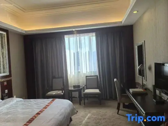 Longzhu Hotel - Chambres