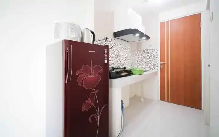 Tidy and Compact Studio at Puncak Dharmahusada Apartment By Travelio