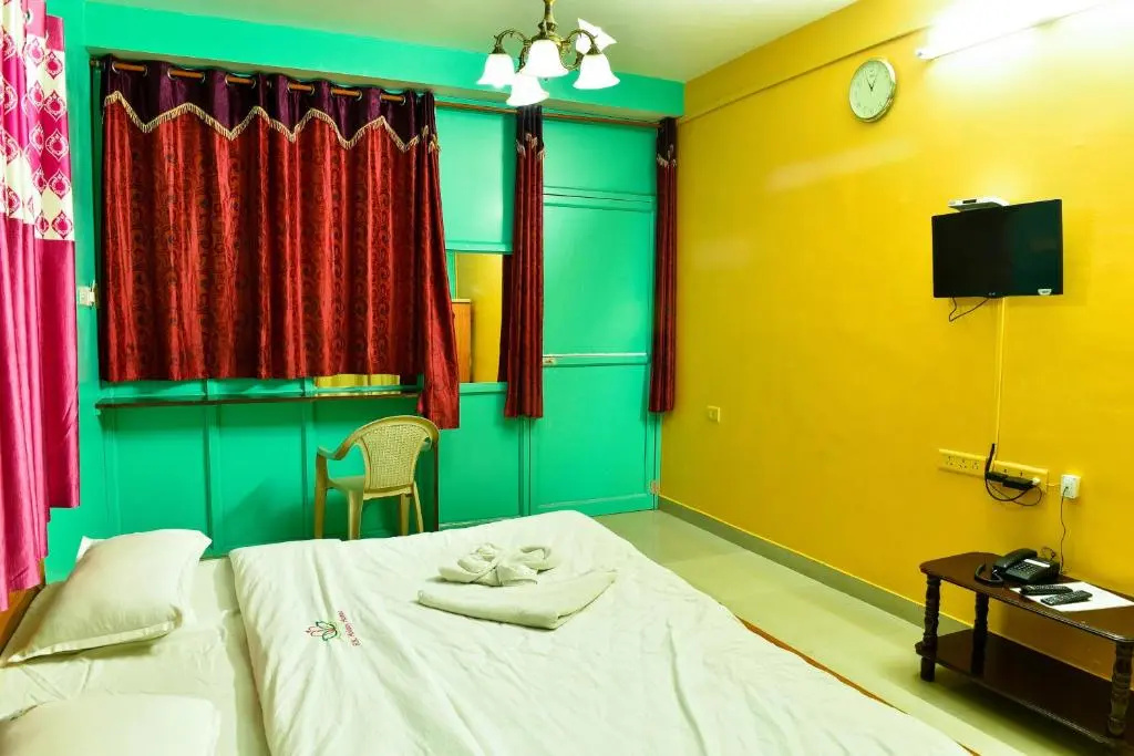RK Holiday Home - Chambres