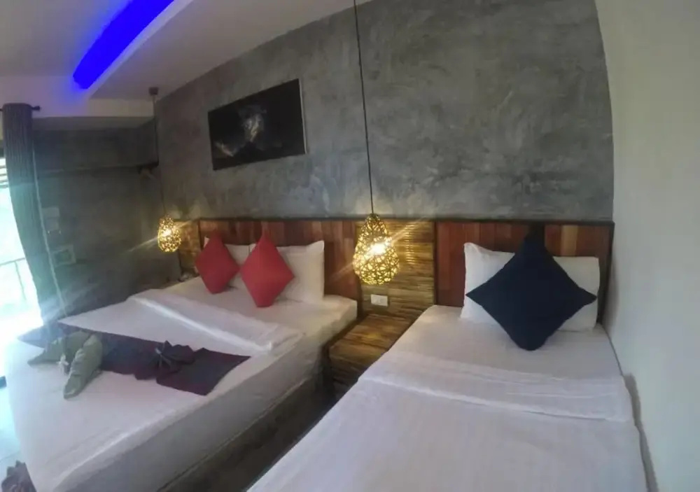 Deluxe Triple room with balcony