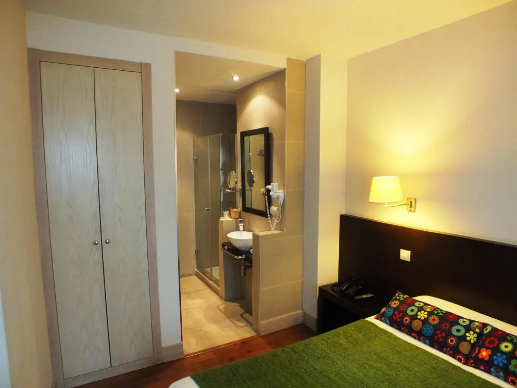 Hotel Puerta Del Arco - Chambres