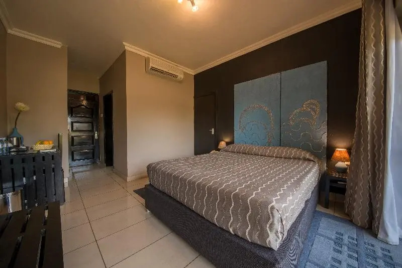 Dolphin Suites - Chambres