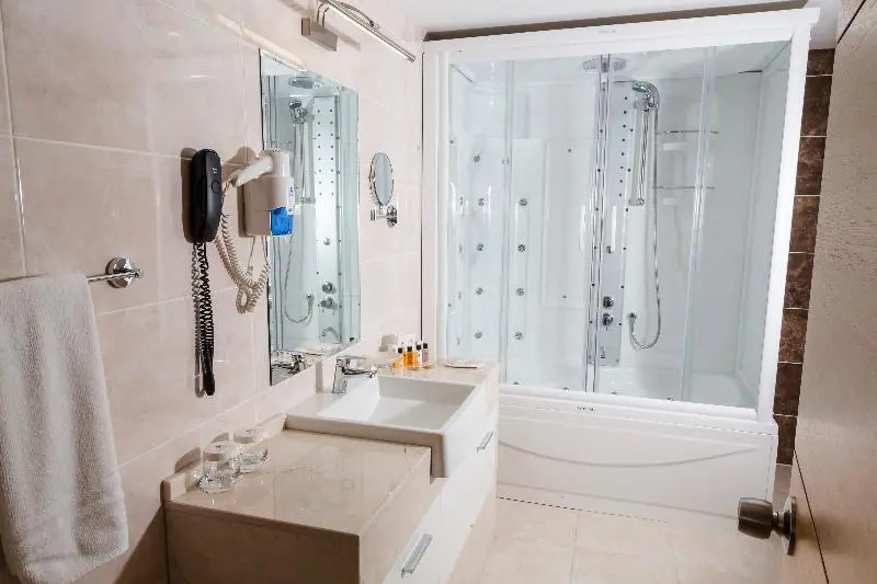Grand Itimat Hotel - Chambres