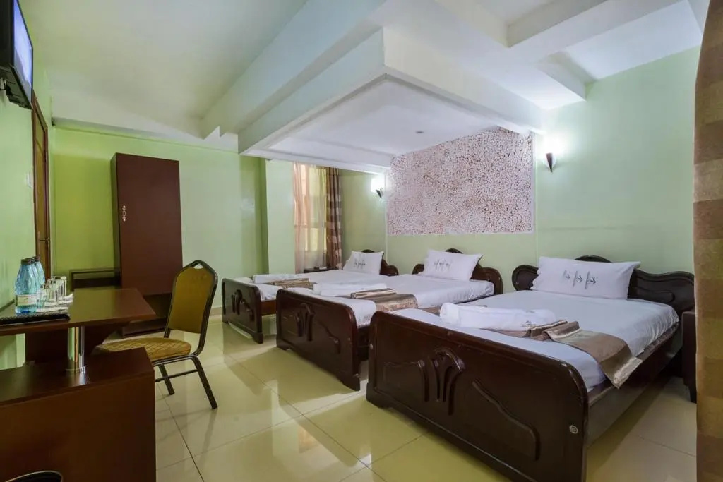 The Legacy Hotel & Suites - Chambres