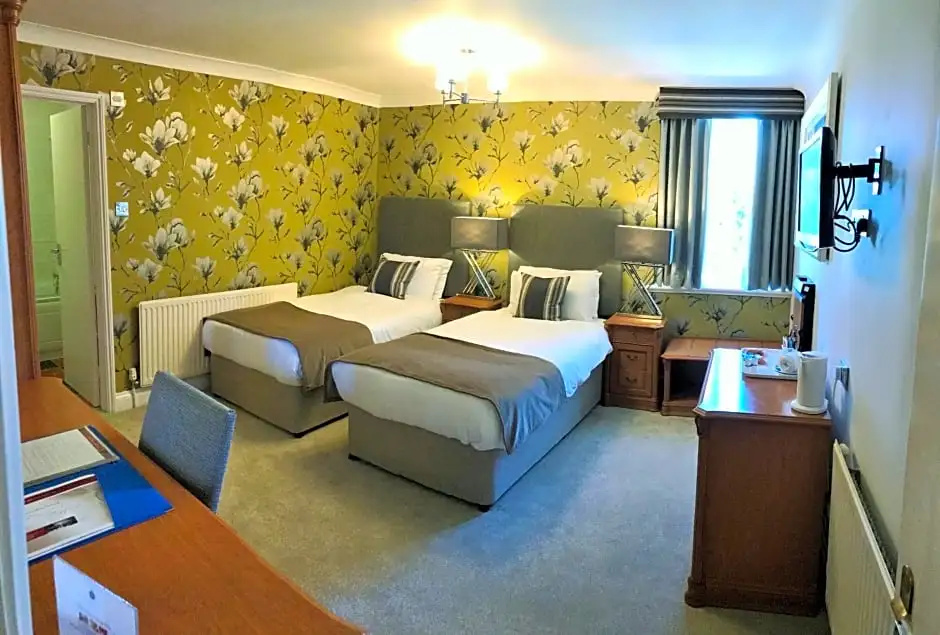 De Rougemont Manor Hotel & Suites - Chambres
