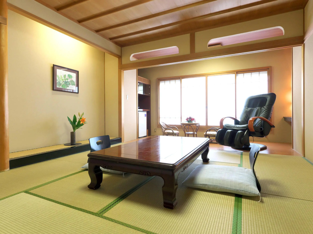 Yuraku Hotel - Chambres
