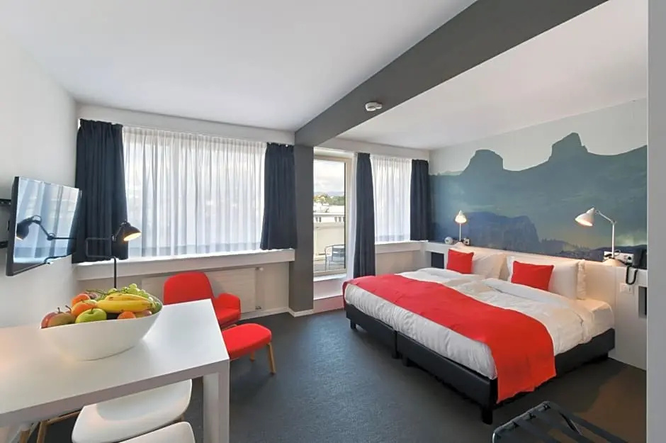 Home Swiss Hotel - Chambres