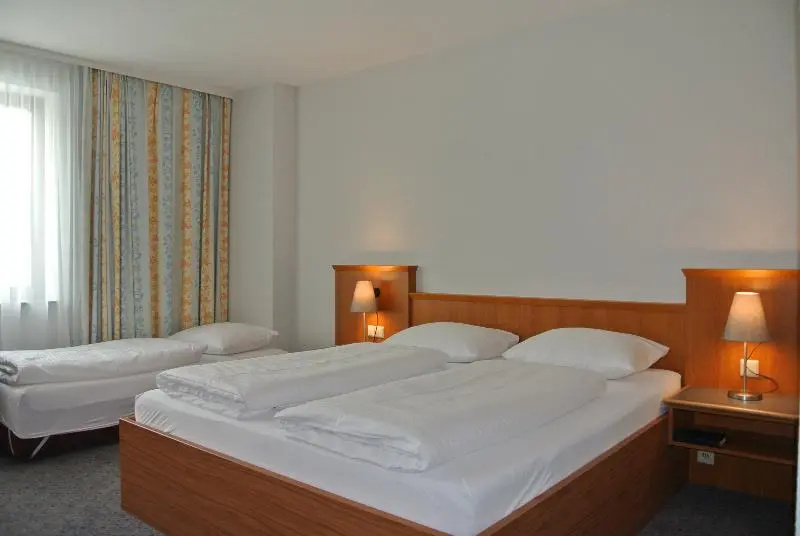 City Hotel am CCS - Chambres