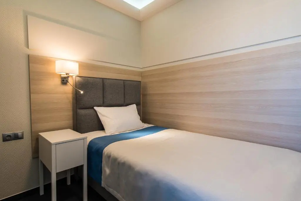 Amrita Hotel - Chambres