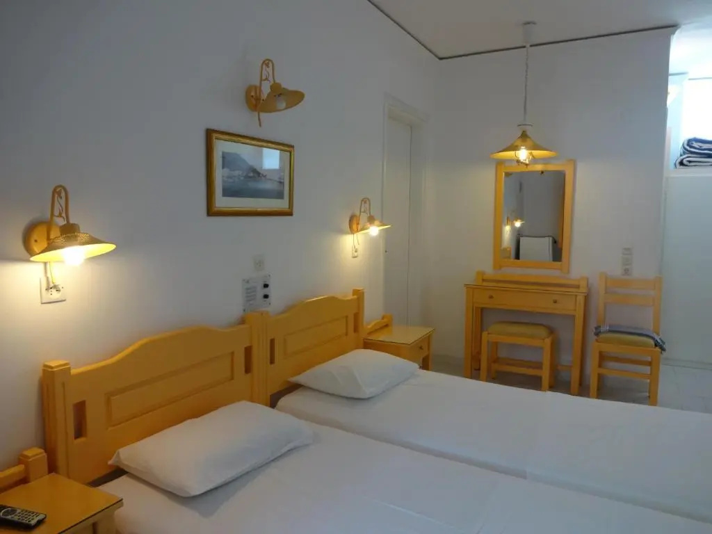 Remezzo Hotel & Studios - Chambres
