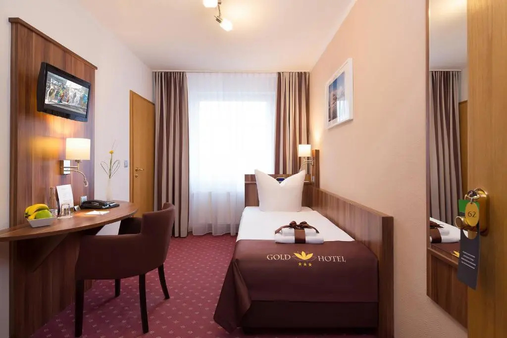 Gold Hotel - Chambres