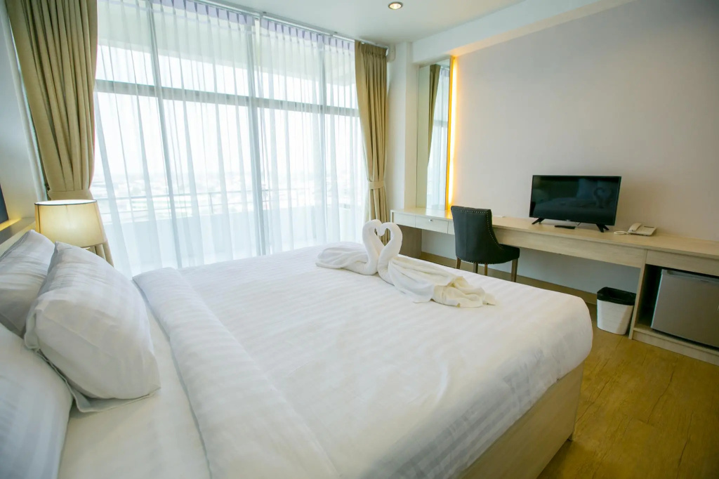 Phrae Nakara Hotel - Chambres