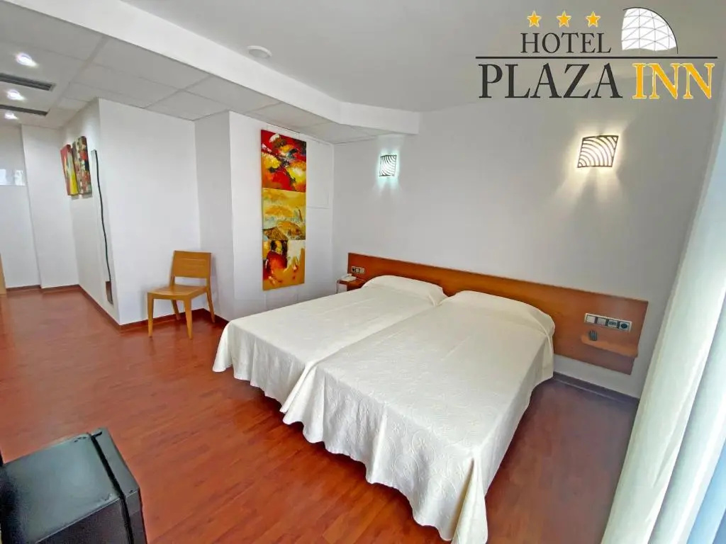 Hotel Plaza Inn - Chambres