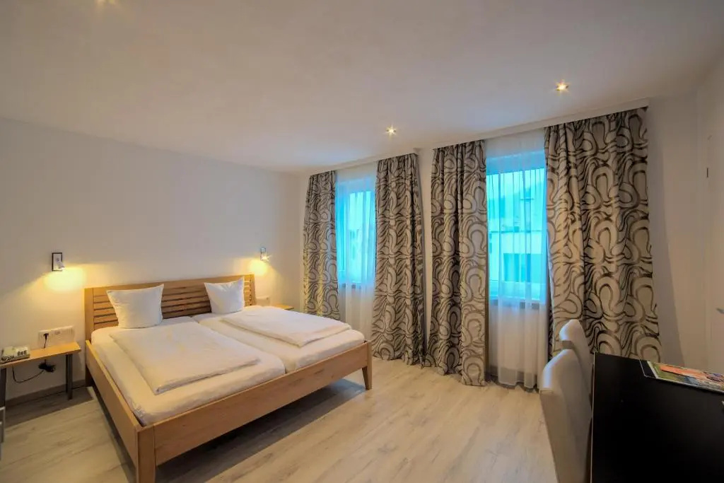 Central Garni - Chambres