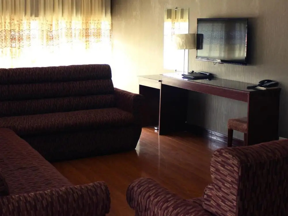 Crown Legacy Hotel - Chambres