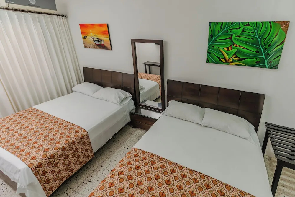 Casa Hotel Miriam - Chambres