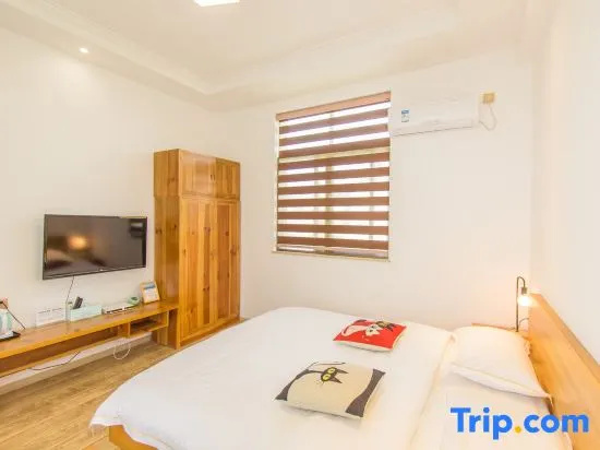 Jue Se Garden Theme Inn - Chambres
