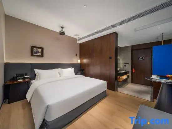 Kunlong Hotel - Chambres