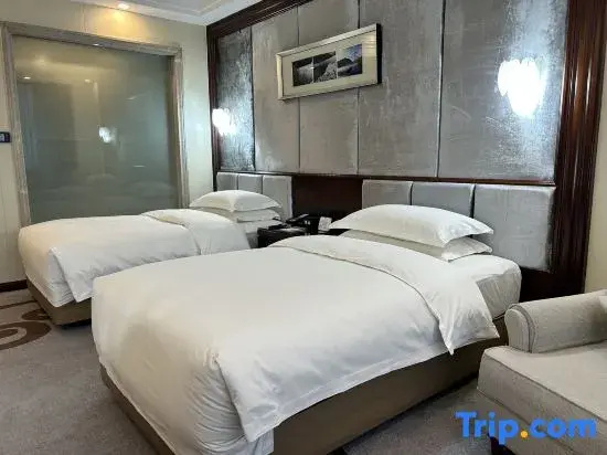 Baiyunbian Hotel - Chambres