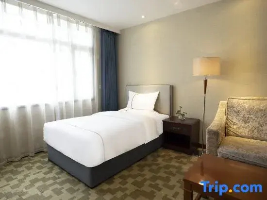 Harmonious Dunpu Hotel - Chambres