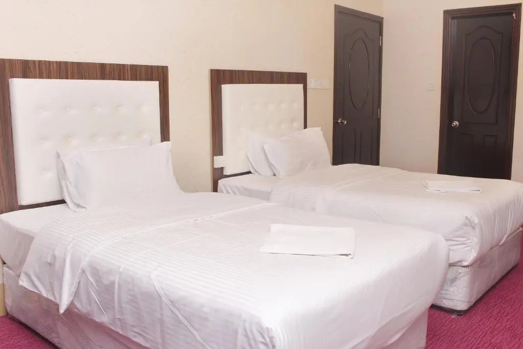 Delmon Hotel Apartments - Chambres