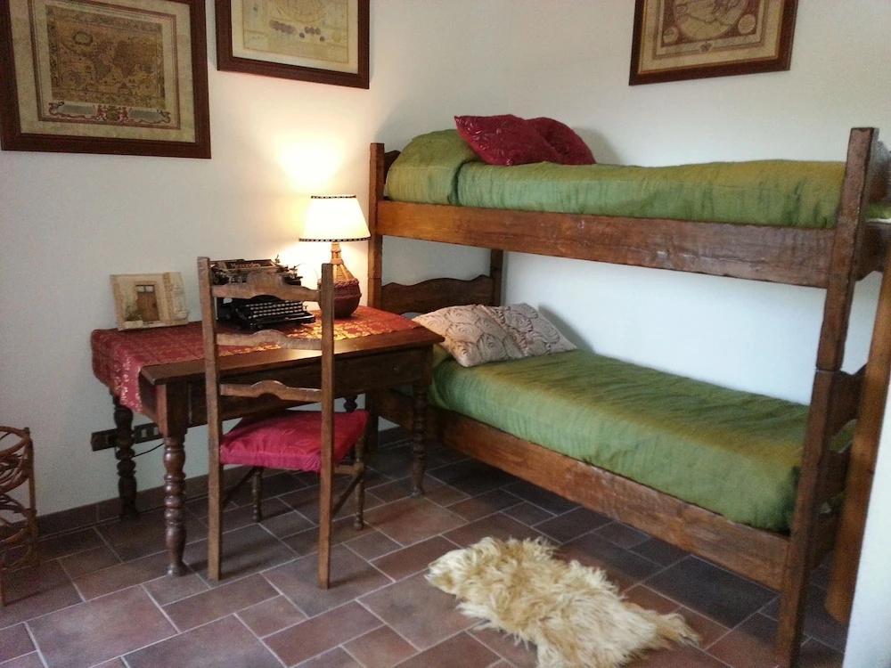 2 Bedrooms Standard Quadruple Family room with garden view