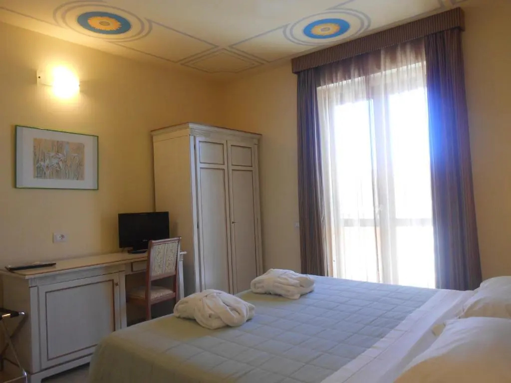Hotel Saturno Fontepura - Chambres
