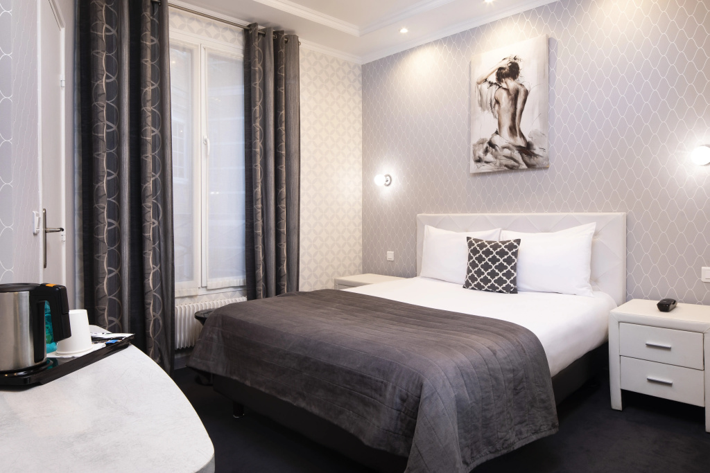 Отель Hotel de Geneve в Париже