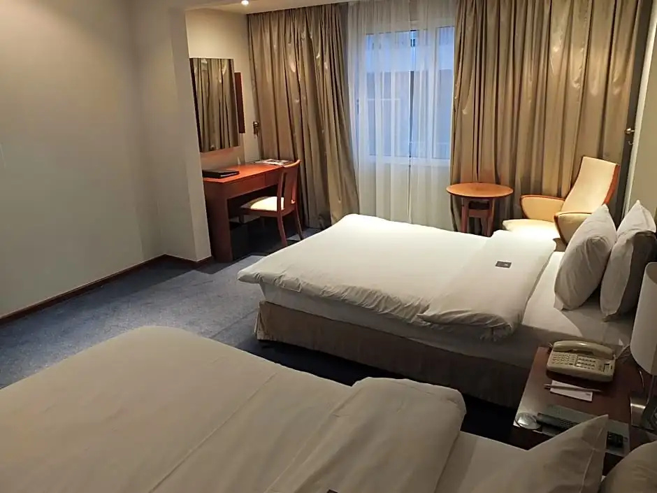 Plaza Hotel - Chambres