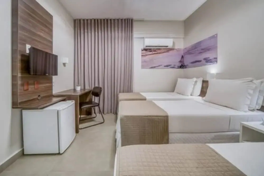 尊爵四人房，配有兩張單人床