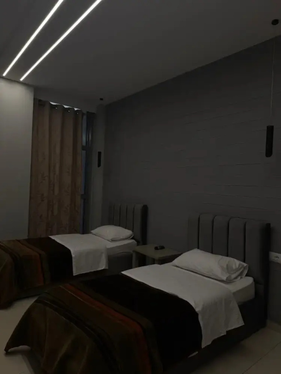 Hotel Gjuta - Chambres