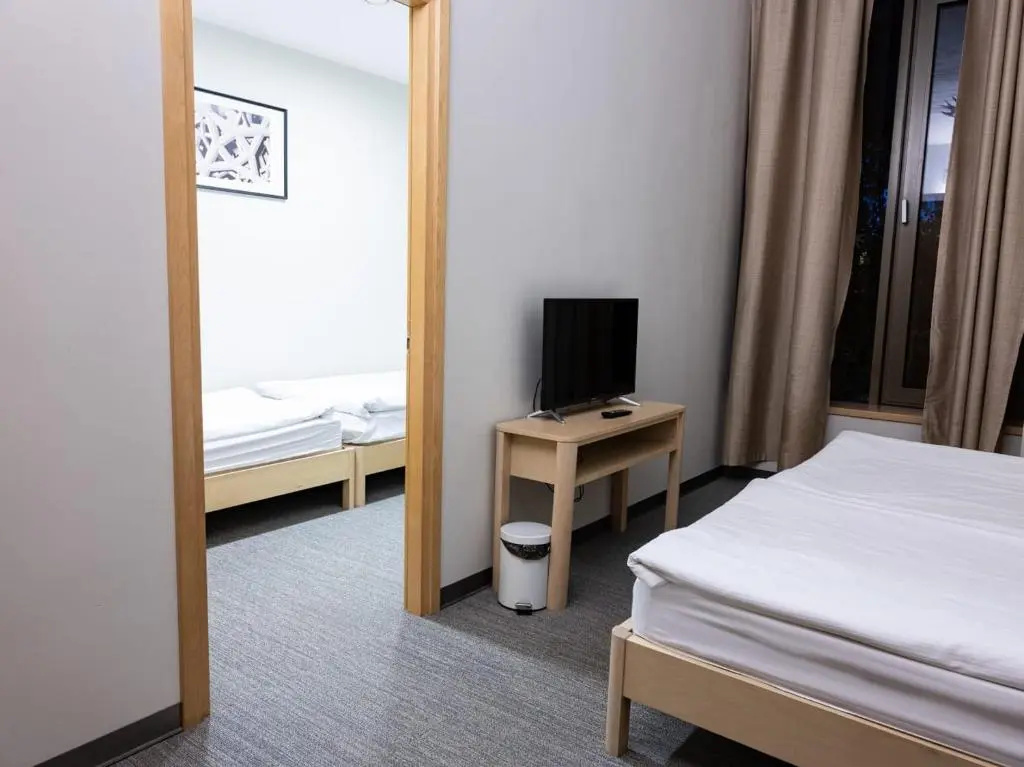 Zaliasis slenis - Self check-in hotel - Chambres