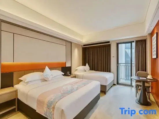 Haikou Tianyi Donghuan Hotel - Chambres