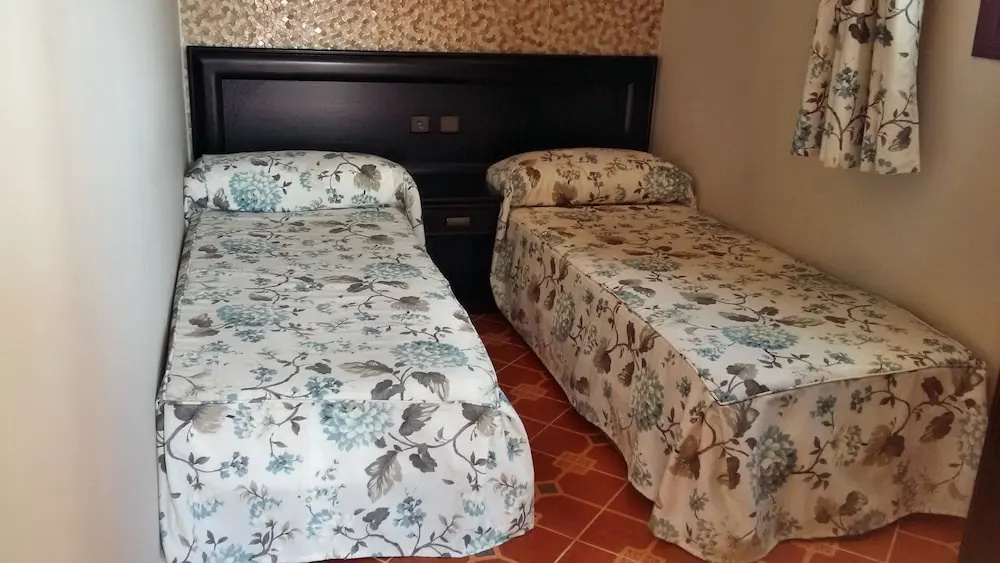 Hotel Maram - Chambres