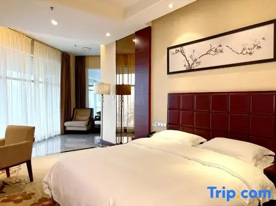 Xinxing Century Hotel - Chambres