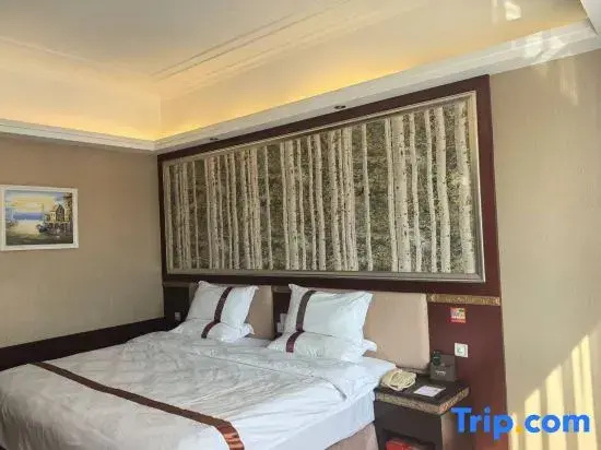 Longzhu Hotel - Chambres