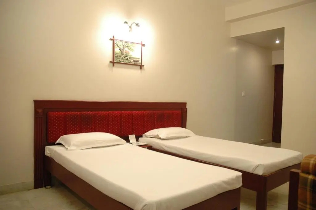 Hotel Gnanam - Chambres